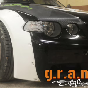 BMW E46 Compact Rocket Bunny Style wide fender flares in carbon fiber, fiberglass, and carbon kevlar for performance and customization.