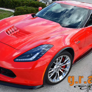 Chevrolet Corvette C7 front lip in carbon fiber, fiberglass, and carbon kevlar, fits OEM bumper for aggressive styling and improved aerodynamics.