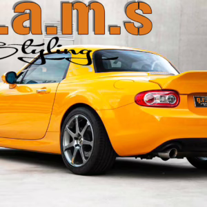 Mazda Miata MX-5 NC rear ducktail spoiler in carbon fiber for improved aerodynamics and race-inspired styling.