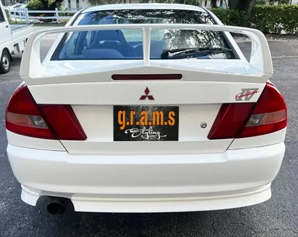 Mitsubishi Lancer Evolution IV rear bumper lip OEM style